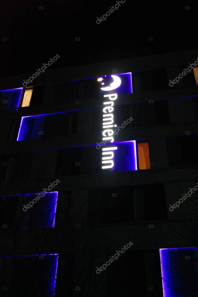 Glasgow Scotland: 13th Feb 2024: Pacific Quay Premier Inn SECC logo illuminated at night