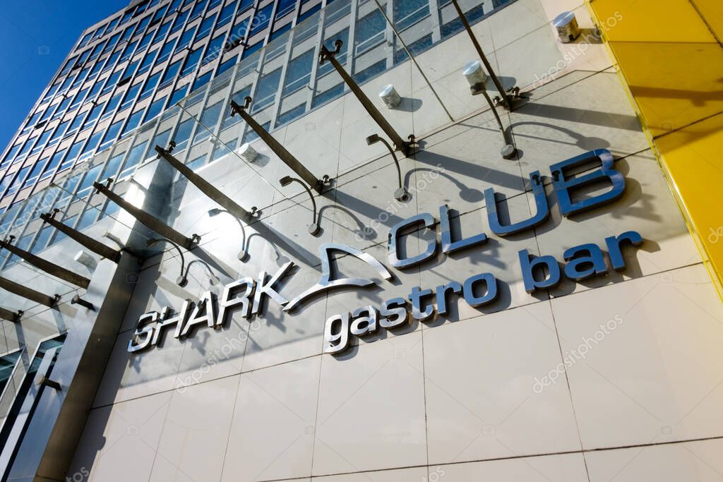 Newcastle UK: 8th June 2024: Shark Club Sports Bar and Grill Newcastle bar and restaurant exterior sign on a sunny blue sky day