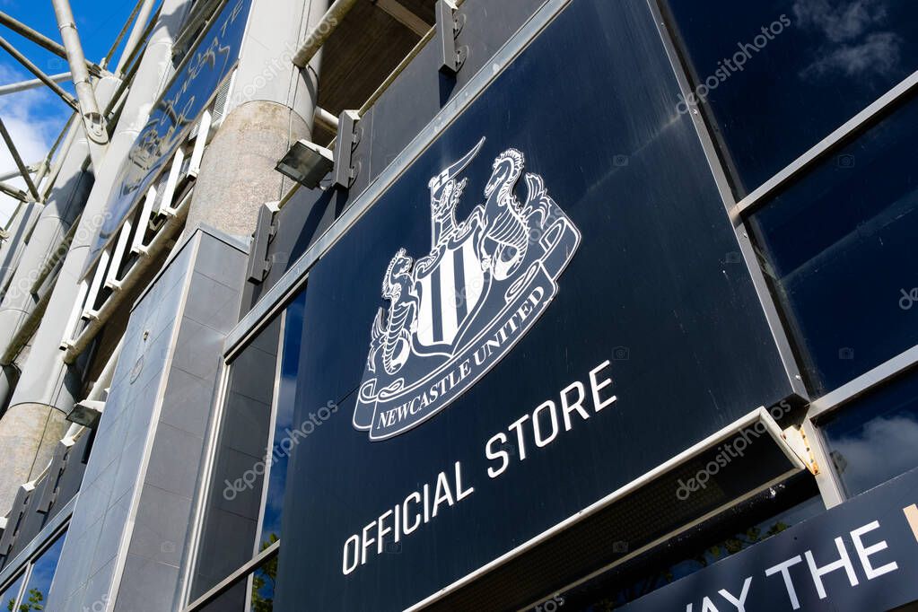 Newcastle UK: 8th June 2024: A close-up shot of the Newcastle United Official Store sign outside St. James Park sunny day