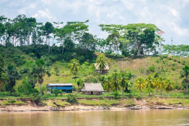 iquitos, peru. 10th september, 2022: shanty village at peruvian amazon riverbank