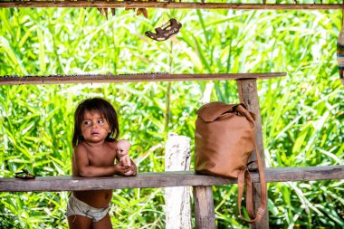 iquitos, peru. 22th september, 2022: portrait of unidentified indigenous at peruvian amazon
