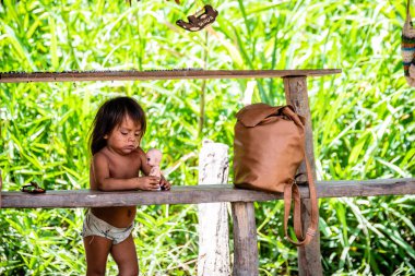 iquitos, peru. 22th september, 2022: portrait of unidentified indigenous at peruvian amazon