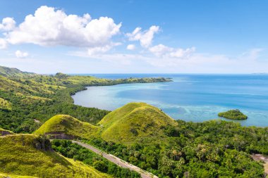 panoramic view of flores island, indonesia clipart