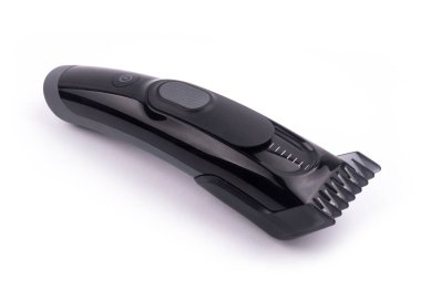 Şarj edilebilir saç makası beyaz arka planda izole edilmiş. Yüksek kalite fotoğraf