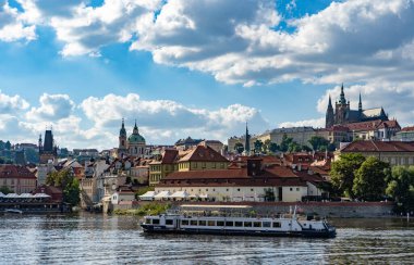 View of the st Vitus cathedral from the embankment of Vltava river, Prague. With nice vintage lantern clipart