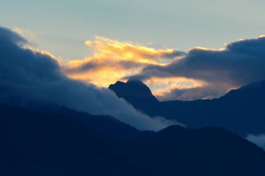 Sunset and clouds above Volcan Baru National Park, Panama clipart