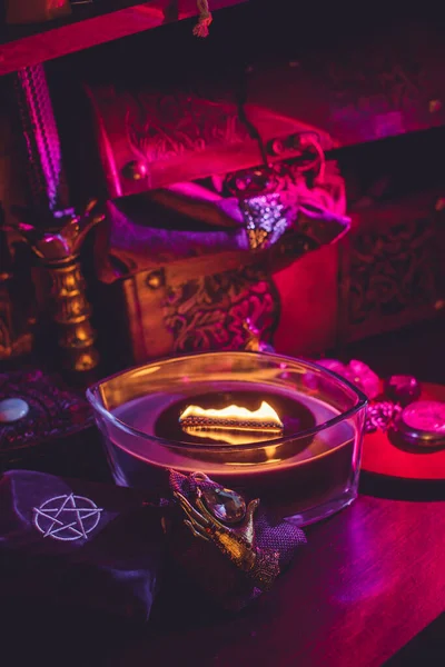 Candle burns on the altar, candles magic, clean aura and removing negative energy, wicca concept