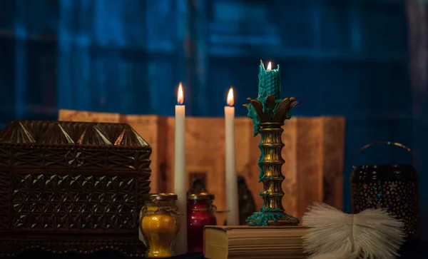 stock image Fortune-telling cards and burning candles on a table on mystic background