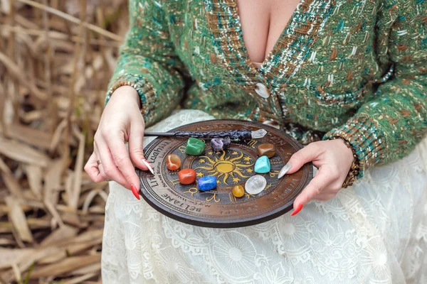 Concept of divination Hippie woman, energy and other magical scene at nature, time...