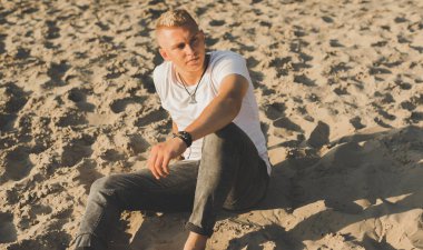 Young man in sadness or depression, grief and bad mood. Psychology problems among guys. Image sad guy thinking about something