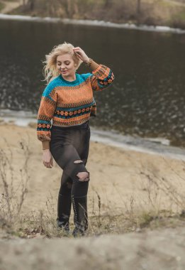 Casual collection of women's clothes. Plus size European blonde woman stylish dress. Concept of sizes, happy nice natural beautiful woman