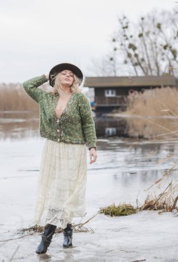 Casual Boho collection of women's clothes. Plus size European blonde woman stylish dress. Concept of sizes, happy nice natural beautiful woman