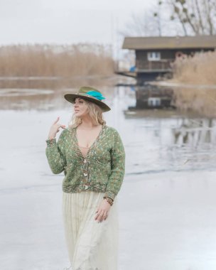 Casual Boho collection of women's clothes. Plus size European blonde woman stylish dress. Concept of sizes, happy nice natural beautiful woman