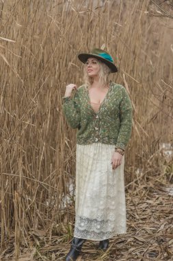 Casual Boho collection of women's clothes. Plus size European blonde woman stylish dress. Concept of sizes, happy nice natural beautiful woman