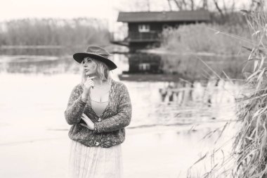 Casual Boho collection of women's clothes. Plus size European blonde woman stylish dress. Concept of sizes, happy nice natural beautiful woman