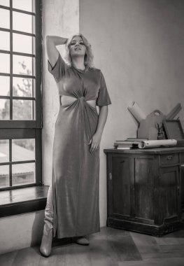 Casual Boho collection of women's clothes. Plus size European blonde woman stylish dress. Concept of sizes, happy nice natural beautiful woman