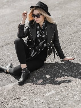 Grunge style, 90-80x trends clothes collection. Woman in black leather jacket. Fashion illustration for magazine