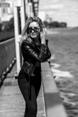 Grunge style, 90-80x trends clothes collection. Woman in black leather jacket. Fashion illustration for magazine