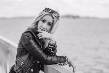 Grunge style, 90-80x trends clothes collection. Woman in black leather jacket. Fashion illustration for magazine