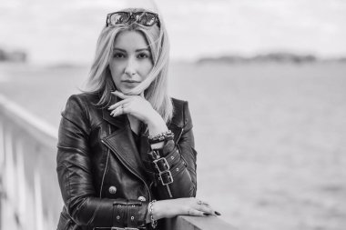 Grunge style, 90-80x trends clothes collection. Woman in black leather jacket. Fashion illustration for magazine