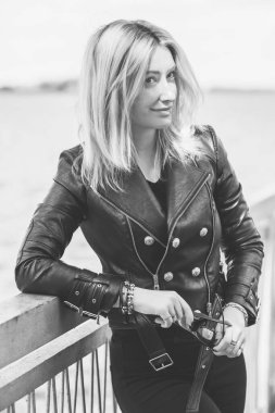 Grunge style, 90-80x trends clothes collection. Woman in black leather jacket. Fashion illustration for magazine