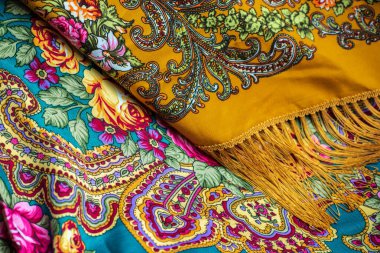 Colorful Boho flowers fabric. Fashionable collection of accessories for women. Detail of wardrobe