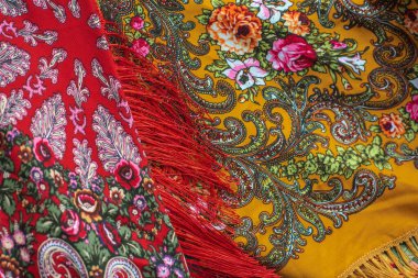 Colorful Boho flowers fabric. Fashionable collection of accessories for women. Detail of wardrobe