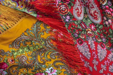 Colorful Boho flowers fabric. Fashionable collection of accessories for women. Detail of wardrobe