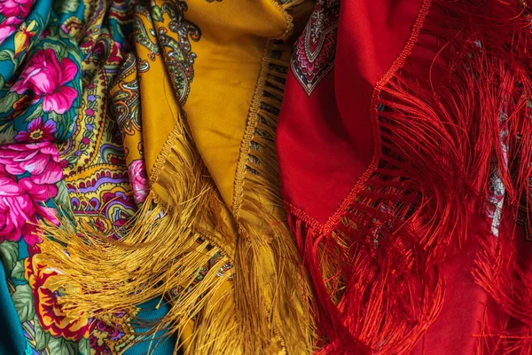 Colorful Boho flowers fabric. Fashionable collection of accessories for women. Detail of wardrobe