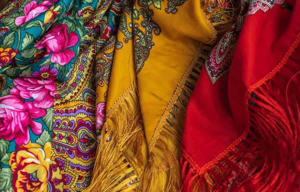 Colorful Boho flowers fabric. Fashionable collection of accessories for women. Detail of wardrobe