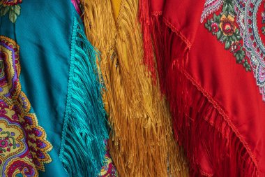 Colorful Boho flowers fabric. Fashionable collection of accessories for women. Detail of wardrobe