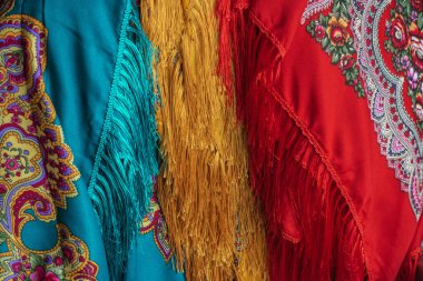 Colorful Boho flowers fabric. Fashionable collection of accessories for women. Detail of wardrobe