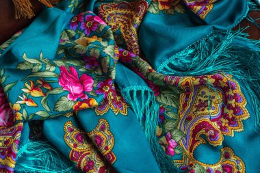Colorful Boho flowers fabric. Fashionable collection of accessories for women. Detail of wardrobe