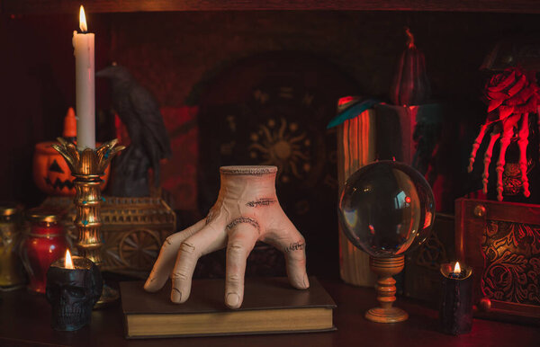 Gothic Family values, composition with a hand "thing". Home decoration for party of Halloween
