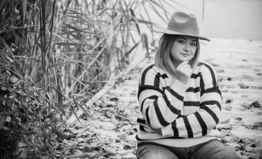 Dissatisfied citizen, the problems of middle aged women. Older plus size woman portrait, she is on one with her own thoughts