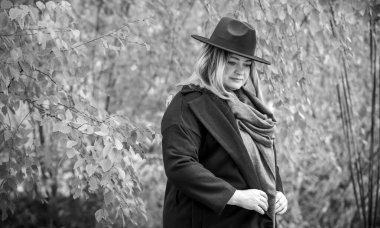 Dissatisfied citizen, the problems of middle aged women. Older plus size woman portrait, she is on one with her own thoughts