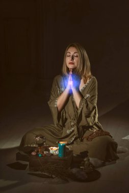 Energy therapy, magic of candles and other attributes, herbs and flowers, Wicca rituals and esoteric concept