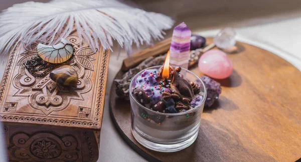 Energy healing, reiki session or chakra rite with candles, wicca magic, new world, alternative medicine