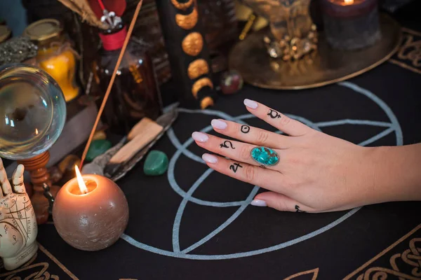 Meaning of rings on a finger. Esoteric and astrology symbol of ring. Scene with a ladies hand