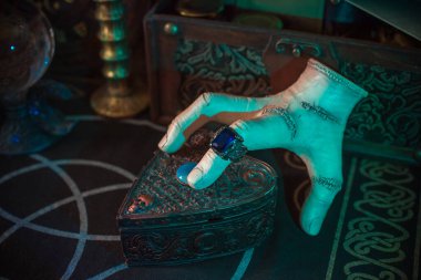 Gothic Family values, composition with a hand 