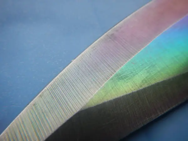 カメレオン金属ナイフのパターンを持つ抽象的な背景 — ストック写真
