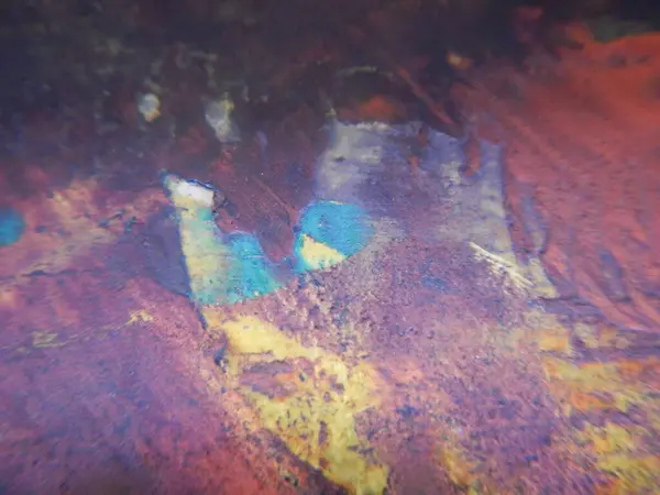 Eski paslı metal plakanın renkli arka planı