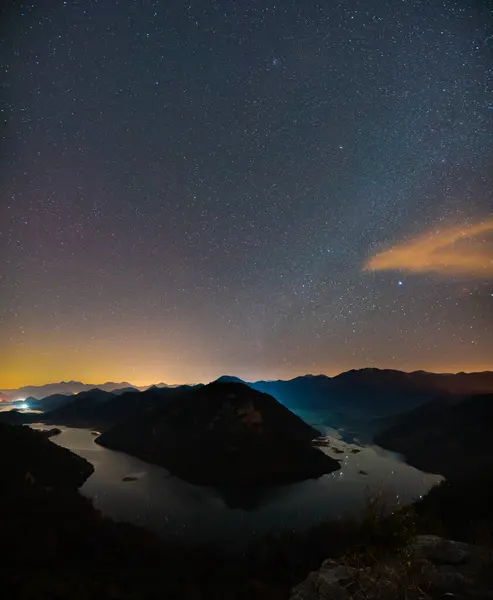 The Green Pyramid and the bend of the Rijeka Crnojevica River, in the northern area of Skadar Lake National Park at night. Montenegro