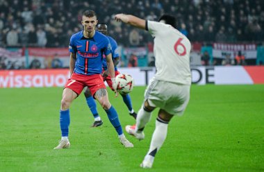 Florin Tanase (FCSB), 30 Ocak 2025 tarihinde Bükreş 'teki Ulusal Arena' da düzenlenen FCSB (Romanya) ile Manchester United (İngiltere) arasındaki UEFA Avrupa Ligi Stage maçı sırasında çekilmiştir..