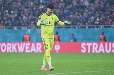 Altay Bayindir, 30 Ocak 2025 'te Bükreş' teki Ulusal Arena 'da oynanan FCSB (Romanya) ile Manchester United (İngiltere) arasındaki UEFA Avrupa Ligi Stage maçında bir golü kutluyor..