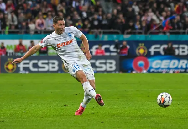 Craiova 'dan Carlos Mora, 17 Mayıs 2025' te Bükreş 'teki Ulusal Arena' da oynanan FCSB ile CSU Craiova arasında oynanan Romanya Superliga maçında resim çekti..