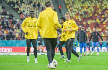 Ebrima Colley (left) and Dominik Pech (right) both of Young Boys, warming up prior to the game against FCSB.