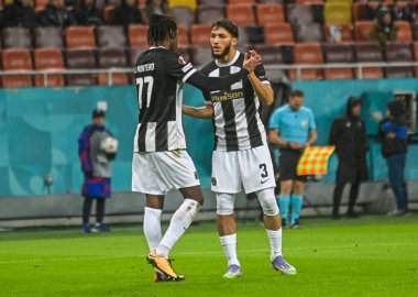 Jaouen Hadjam congratulates Joel Monteiro after the first goal scored during the 2025/26 UEL Matchday 2 game Between FCSB (ROU) and BSC Young Boys (SWI).