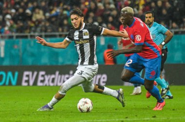 Jaouen Hadjam and Baba Alhassan pictured during the 2025/26 UEL Matchday 2 game Between FCSB (ROU) and BSC Young Boys (SWI).