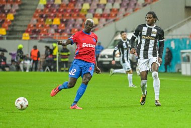 Baba Alhassan and Joel Monteiro pictured during the 2025/26 UEL Matchday 2 game Between FCSB (ROU) and BSC Young Boys (SWI).